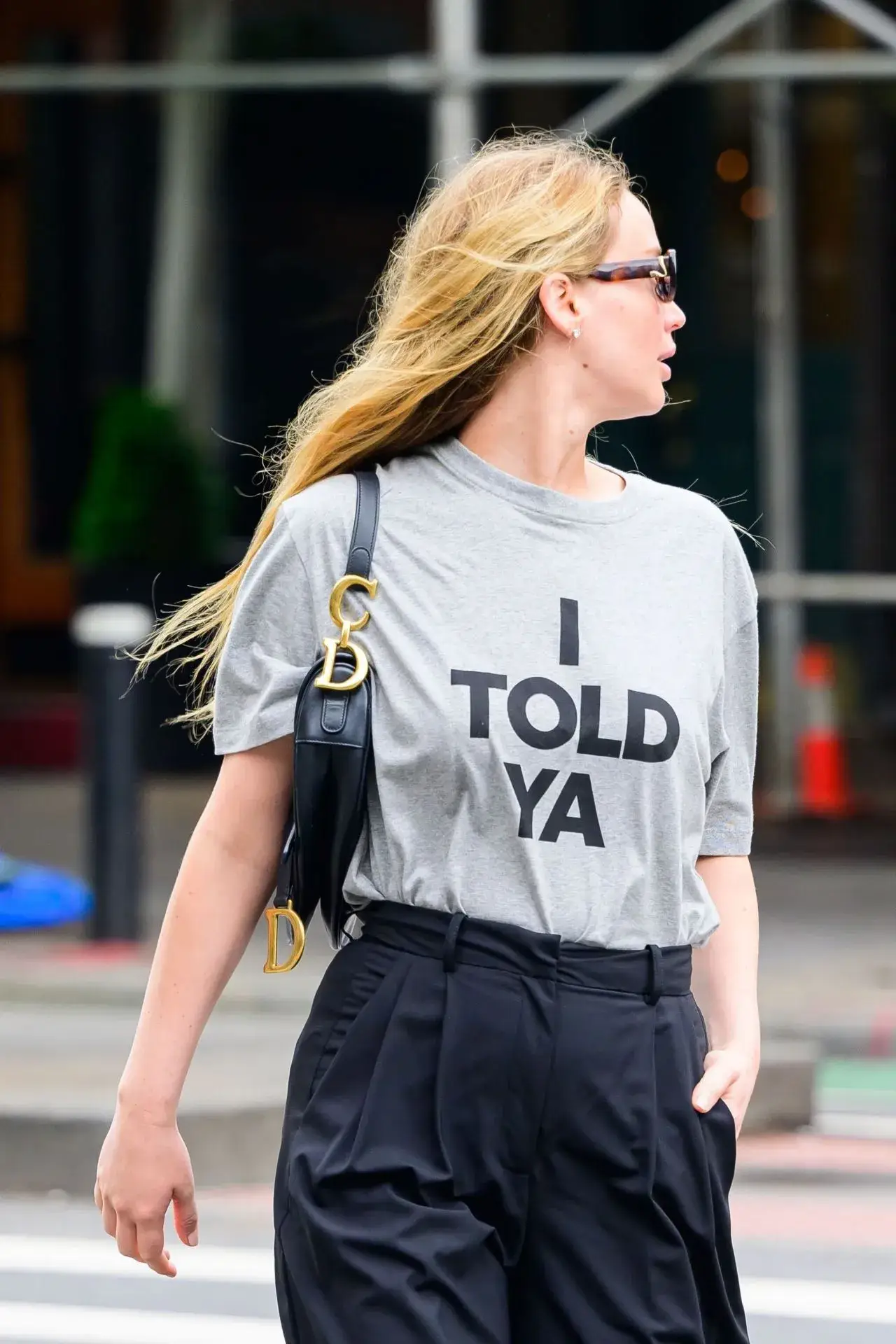 Jennifer Lawrence Stills in Loewe T shirt Black Pant New York City Street